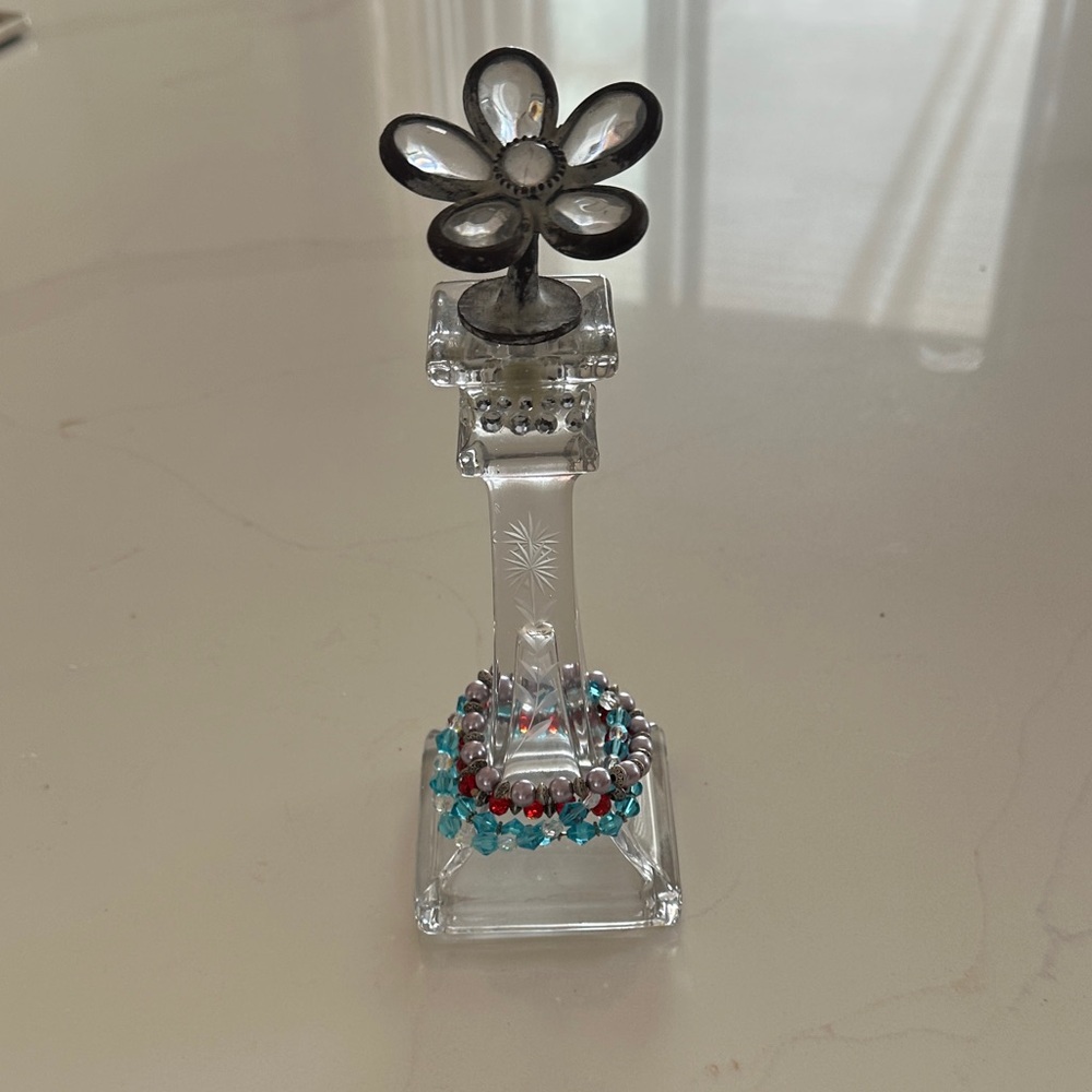 Glass Flower Candle Holder turned bracelet holder.